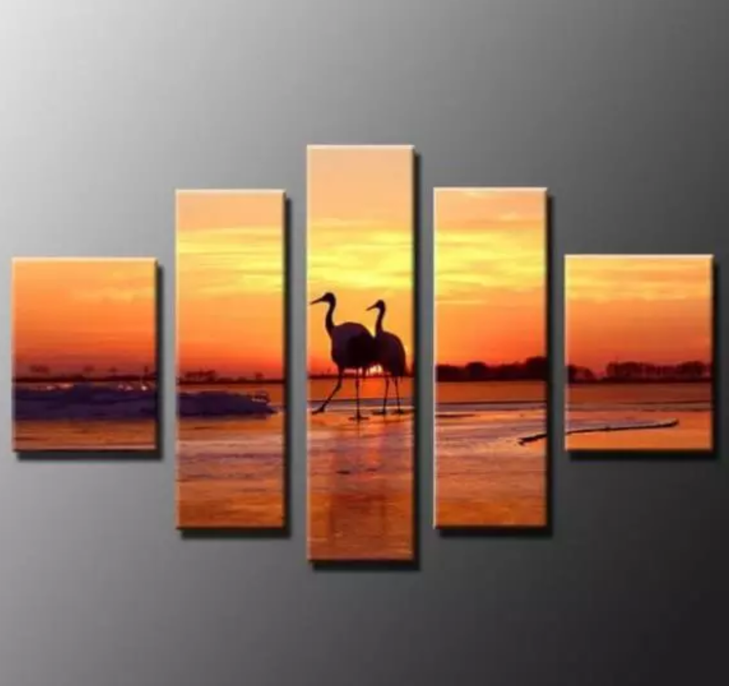 Cranes on the Beach at Sunset