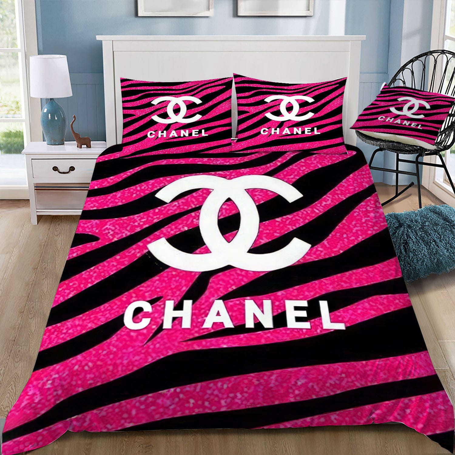 Chanel Duvet Cover Set Chanel duvet cover set featuring a vibrantly printed design with pink and black stripes, showcasing the iconic Chanel logo.